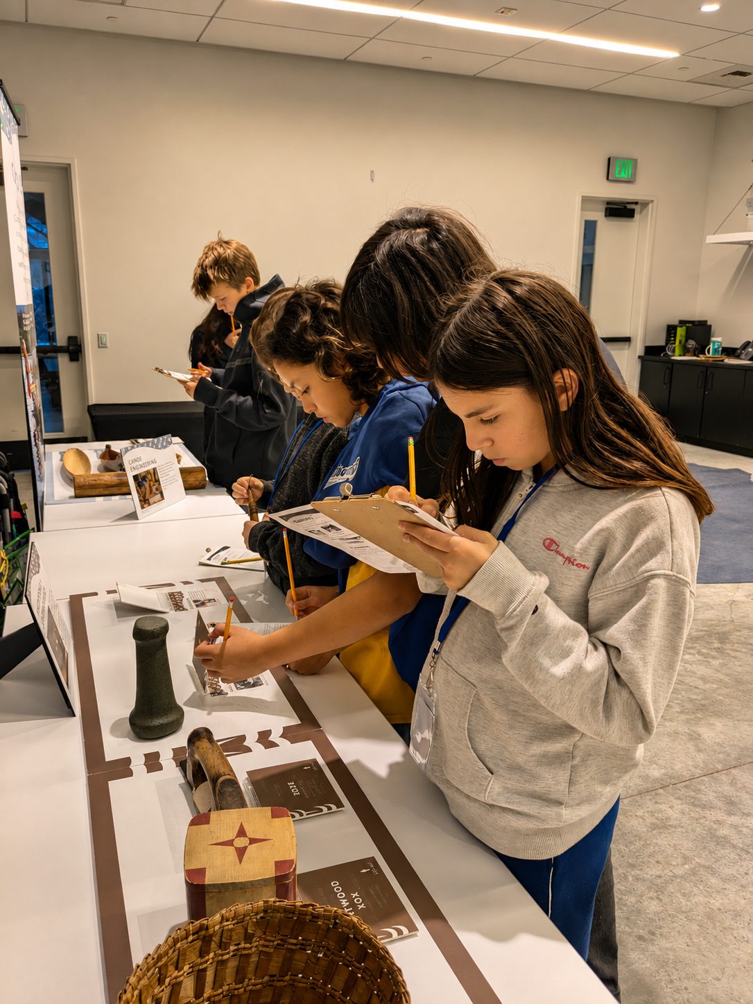 Middle school students presenting research to classmates