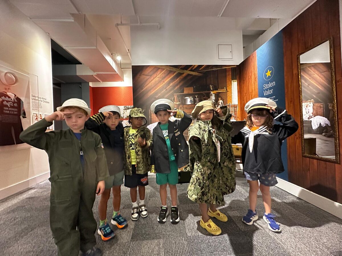 Students in costume on a museum field trip